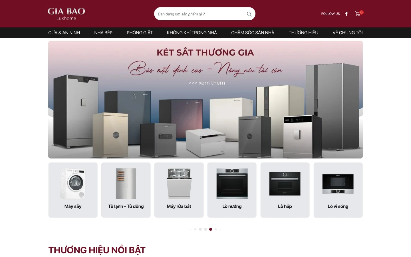 Màn hero website Gia Bảo Luxhome với banner két sắt thương gia và lưới danh mục thiết bị